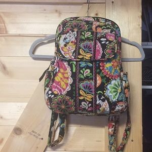 Vera Bradley Mickey & Minnie print backpack.